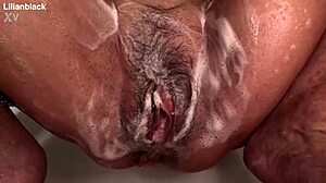 her plump curves glisten as she fingers her big clit to a soaking wet orgasm in the shower