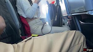crazy babe flashes huge tits gives risky public airplane handjob till cum