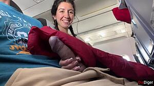 crazy babe flashes huge tits gives risky public airplane handjob till cum
