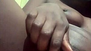 pretty young black babe masturbates her beautiful pussy in amateur solo moment