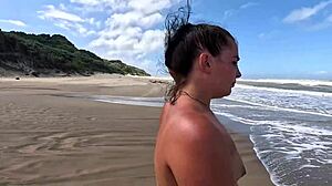Amateur chubby brunette beach blowjob ends in public cumshot walk after handjob