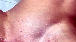 horny skinny blonde masturbates with dildo in shower to squirting orgasm