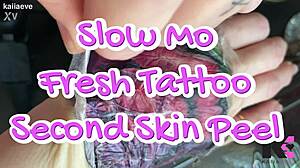 fresh tattoo peels off like second skin in slow mo tease