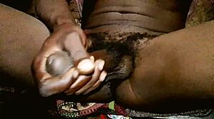 Kenyan stud strokes his cock until massive cum explosion