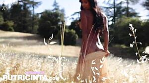 putri cinta tweaks her big asian tits and nipples in golden fields!