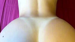 big ass view from behind while she rides hard