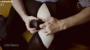 Deep anal fisting stretches gaping asshole in black dress