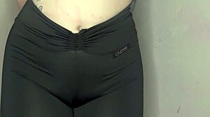black leggings hug her cameltoe tight in yoga tease