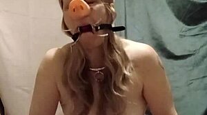 French slave endures indoctrination fellatio pig snout spreader session