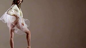 blonde gymnast stretches in flexible acrobatic gymnastics routine