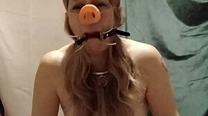 French slave endures indoctrination fellatio pig snout spreader session