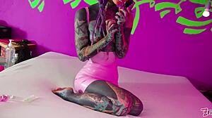 wanna see this tattooed babe wreck her ass solo with toys
