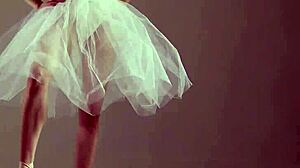 blonde gymnast stretches in flexible acrobatic gymnastics routine