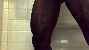 Amateur black guy strokes monster bbc in homemade shower masturbation session