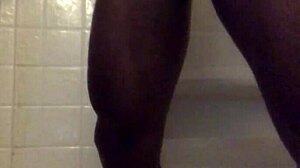 Amateur black guy strokes monster bbc in homemade shower masturbation session