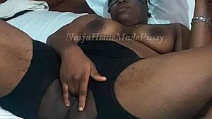 fat ebony rubs pussy chatting with boyfriend on webcam