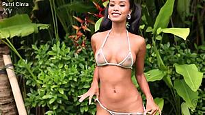 putri cinta poses nude in indonesian paddling pool