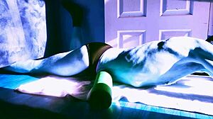 sped up winter stretching in briefs roller on floor for sun relief