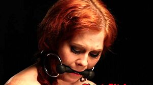 hey redhead tattooed femdom, why mistreat your bound lesbian sub like that?