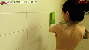 sissi's slim curves glisten seductively under shower streams at dollscult