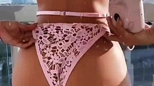 pink lingerie clings to latina curves teasing sexy secrets