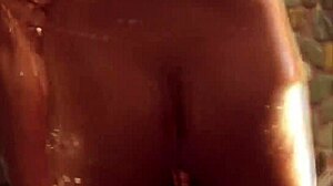 her oiled feet glide over him during intimate asian nuru massage turning erotic