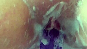 oh god im rubbing my soaked pussy with this huge purple dildo in the bath till i explode