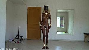 Oily ebony goddess shakes her perfect tits and juicy ass
