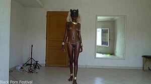 Oily ebony goddess shakes her perfect tits and juicy ass