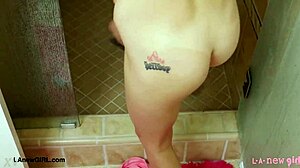 blonde teen exposes shaved body in steamy bath