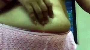 Indian beauty undresses teasing boobs building hot foreplay tension