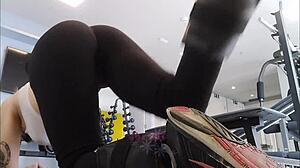 chatty blonde teases and flashes her curves during gym workout