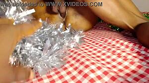 Blonde babe dances Feliz Navidad Christmas carol