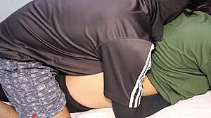 the indian bhabhi slips off her black dress and rides her husband's big cock in steamy hindi roleplay on the bed
