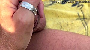 Little milf jerks huge cock on beach till cum explosion!
