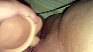 she slides that colorful bodysuit dildo deep into her wet latina pussy lips while moaning loud.