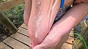 granny flashes huge saggy tits in half hitch corset outdoors