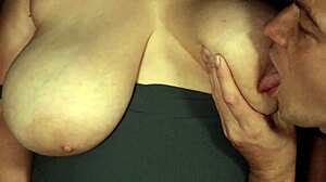 close-up sucking on those hard puffy nipples and natural tits