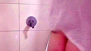 nicole shakes her fat ass and cute tits all wet in the shower