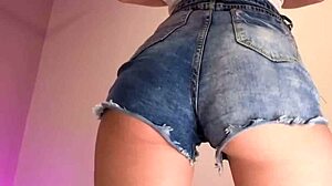 those tiny denim shorts barely cover her juicy ass cheeks