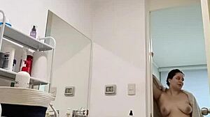 nicole shakes her fat ass and cute tits all wet in the shower