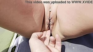 i finger my milf pussy outdoors till squirting at the beach piercing exposed