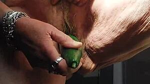 oma fucks her hairy pussy with huge cucumber