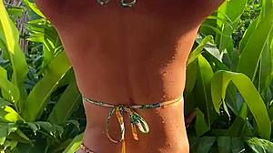 tanned bikini beauty grinds hard in tropical garden sun