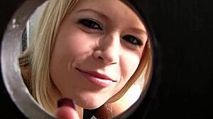 nympho blonde teen bitch deepthroats big black cock through public toilet gloryhole