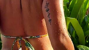 tanned bikini beauty grinds hard in tropical garden sun