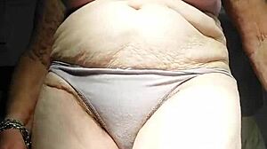 oma fucks her hairy pussy with huge cucumber