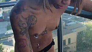 renity love straps kashofficials on the balcony outside