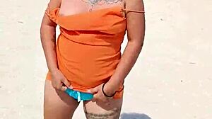 doesn't this horny mexican puta flashing her thong and tits on public beach turn you on?