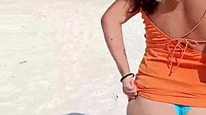 doesn't this horny mexican puta flashing her thong and tits on public beach turn you on?